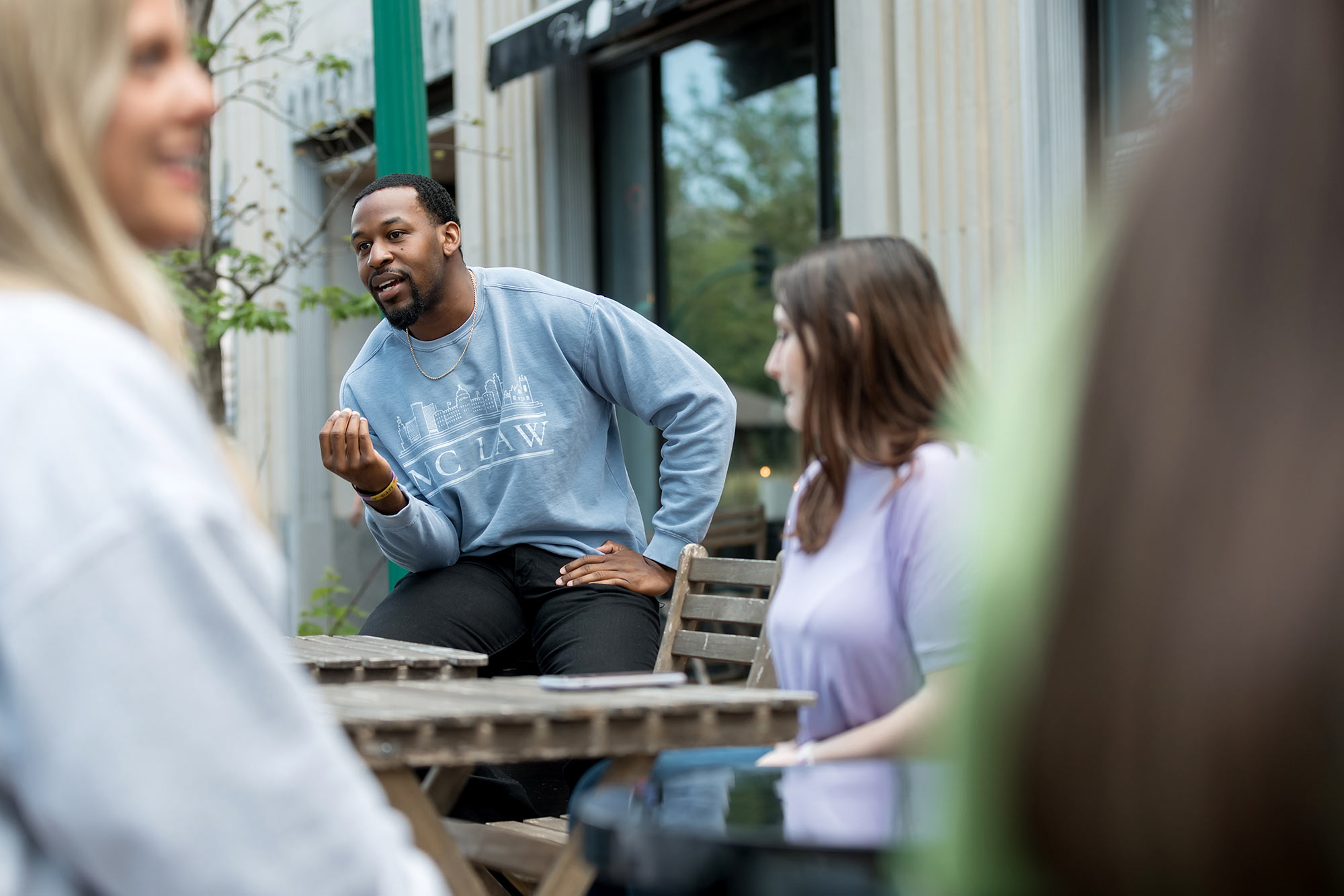students talking outside